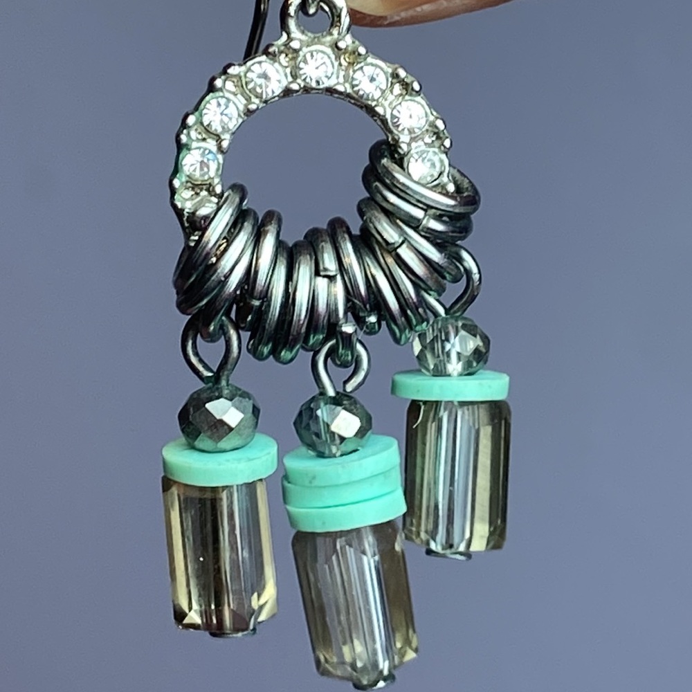 A pair of chandelier eccentric earrings very unusual